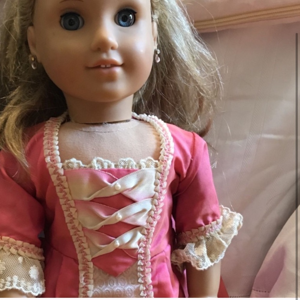 Blonde American girl doll and blue outfit